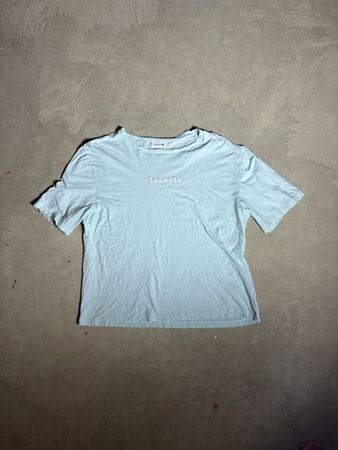 T-shirt Lacoste bleu clair taille 38 bon état