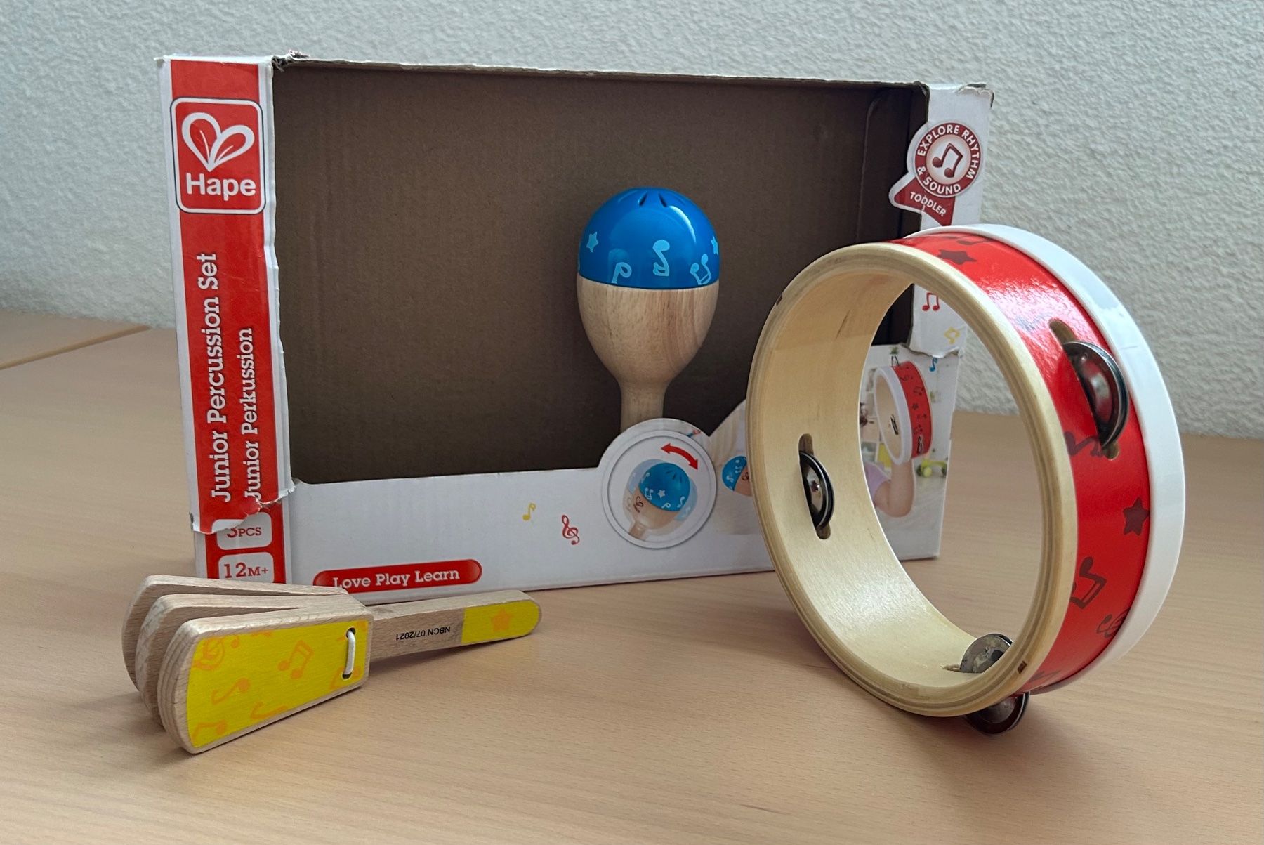 Hape Giocattoli: Kleinkinder Musik: Schellenkranz - Rassel - Kastagnette – Usato da Ittigen venduto da labrador35 1