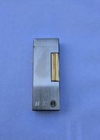 Feuerzeug Dunhill silberfarben goldfarbene Akzente Swiss 