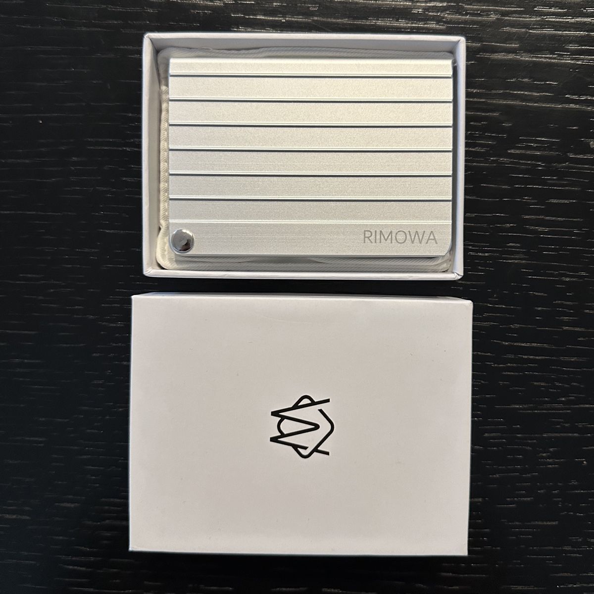 Portafogli: Rimowa Cardholder Aluminium – Usato da St. Gallen venduto da Alpenfuerst