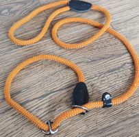 Orangefarbene Hundeleine aus robustem Seil mit Zugstopper