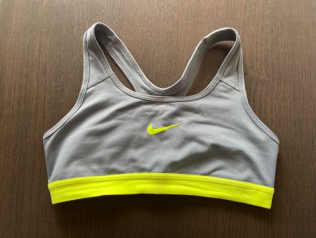 Brassière de sport Nike Dri-FIT gris/jaune fluo T.S ?...