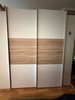 Grande armoire à porte coulissante