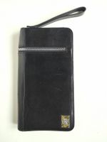 Diesel porte-passeport en cuir noir avec dragonne et housse