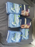 Lot de couches femme et serviette hygiénique 