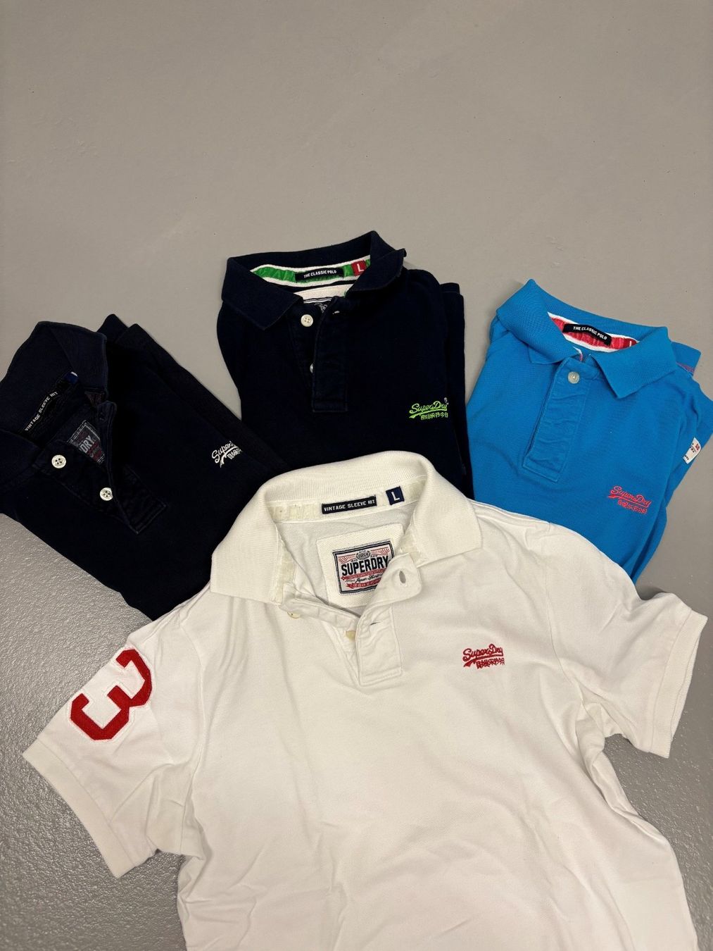 Superdry Polo-Shirts: Superdry - Polos – Neu (gemäss Beschreibung) aus Winterthur von TopGun9