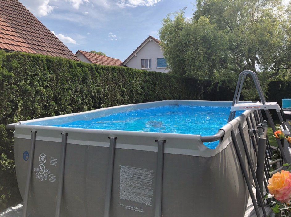 Intex Schwimmbad: Intex Ultra Frame Pool 5.49x2.74m mit Sandfilter und Heizung – Gebraucht aus Schweizersholz von trademaster_24