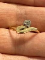 Bague en or 14 carats avec petit diamant