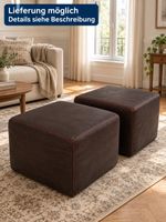 2 Natuzzi Lederhocker in Braun, vielseitig und stilvoll