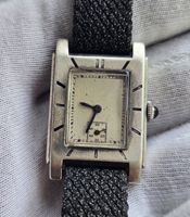 Montre bracelet rectangulaire argent .swiss 