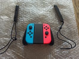 Original Nintendo Switch Joy-Con Set (Neon-Rot/Blau) + Grip