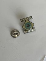 Pin Kühnis Brillen Logo