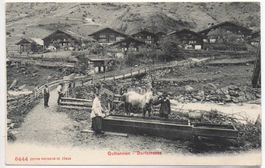 GUTTANNEN Dorfstrasse - Bauer mit Pferd am Brunnen