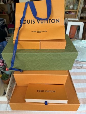 Set of louis vuitton and gucci boxes