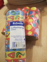 Luftschlangen Clown und Dots