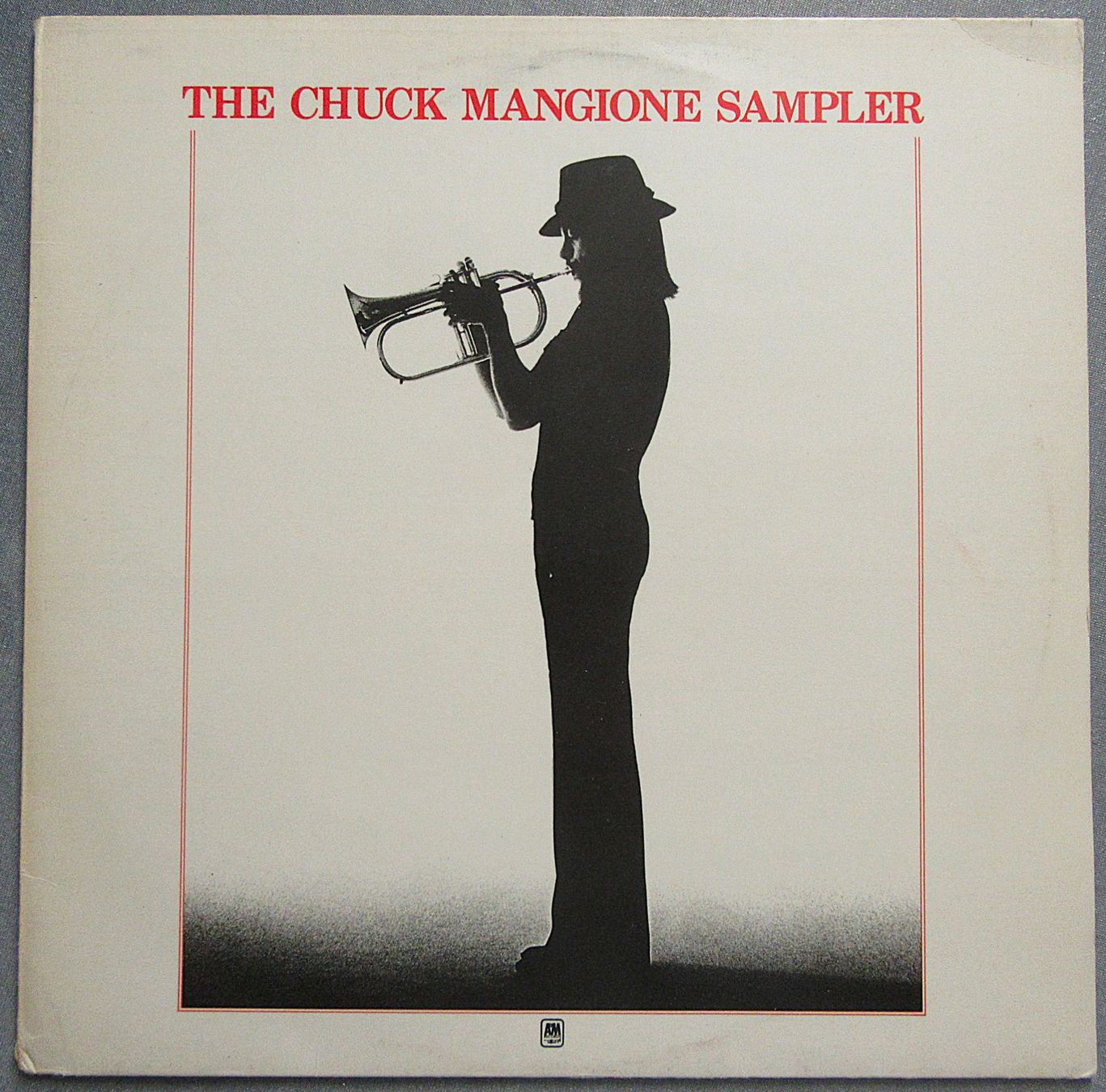Dischi in vinile: LP - Chuck Mangione - The Chuck Mangione Sampler – Usato da Auenstein venduto da Padabimbim