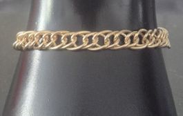 Bracciale dorato maglia spessa, lunghezza regolabile, nuovo