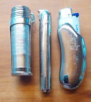 spezielle Feuerzeuge,  1 schwerer Metallmantel, 1 Dose
