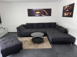 Sofa mit Hocker