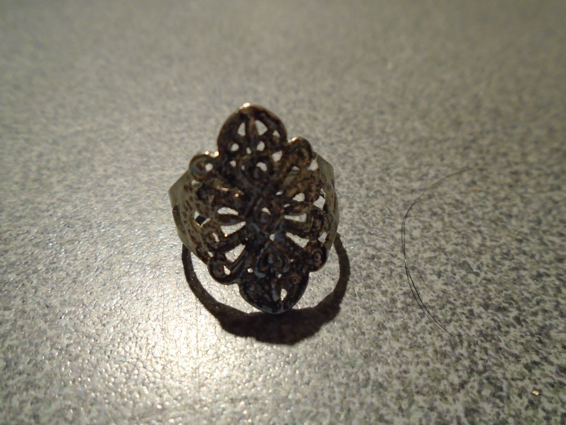 Bagues: Ring silberfarbig, geschwungen – Neuf avec emballage d'origine à Zürich par abraxas1291