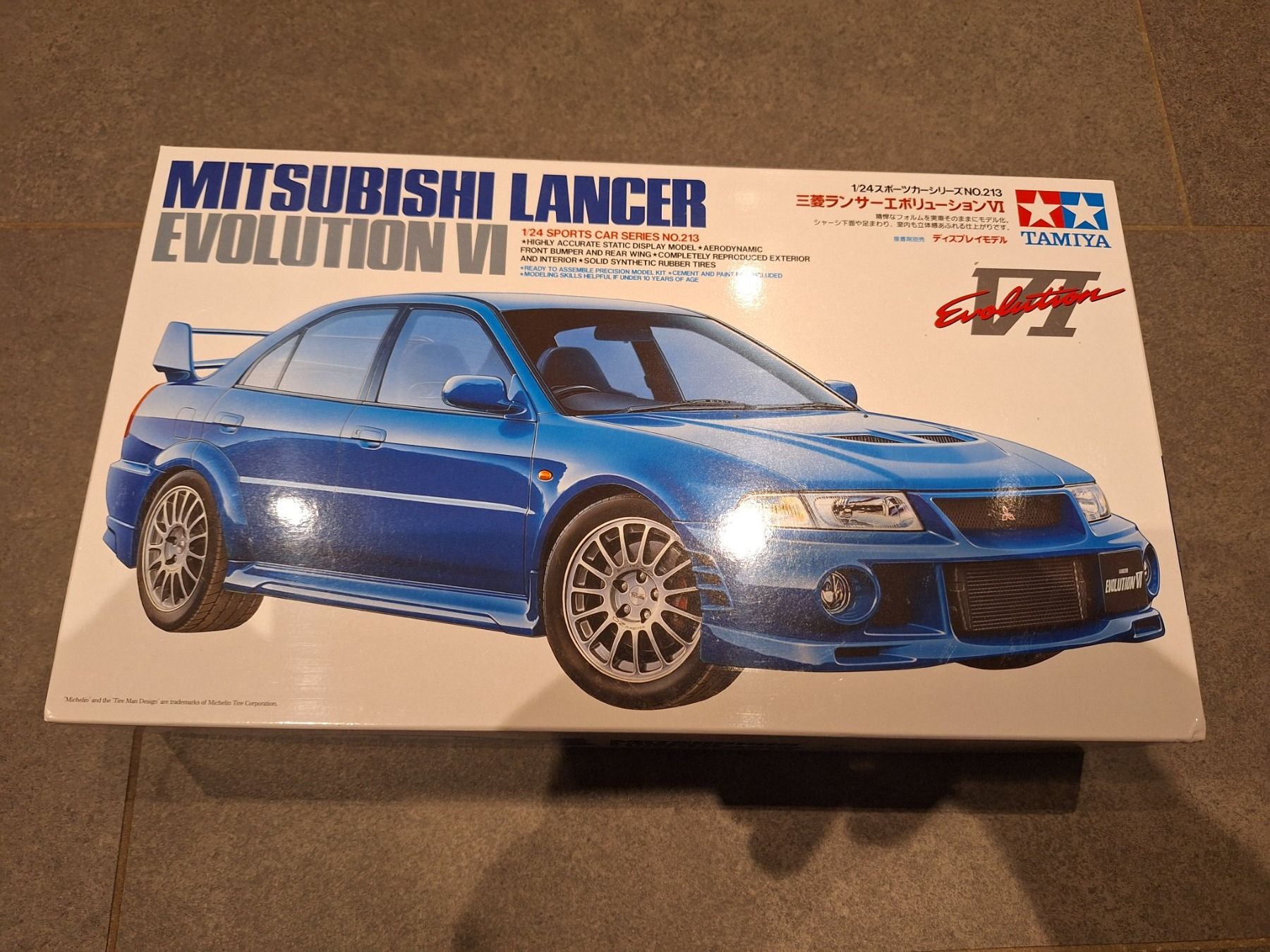Kit di costruzioni: Tamiya Bausatz 1:24 Mitsubishi Lancer Evolution VI – Nuovo e nell'imballaggio originale da Adlikon venduto da Mmartin0
