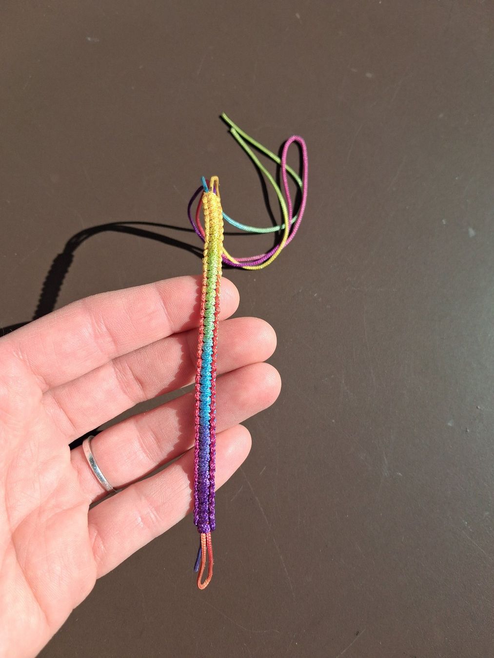Bracciali & Braccialetti: Stoffarmband Regenbogenfarben, Neu! – Nuovo e nell'imballaggio originale da Wald ZH venduto da e8e
