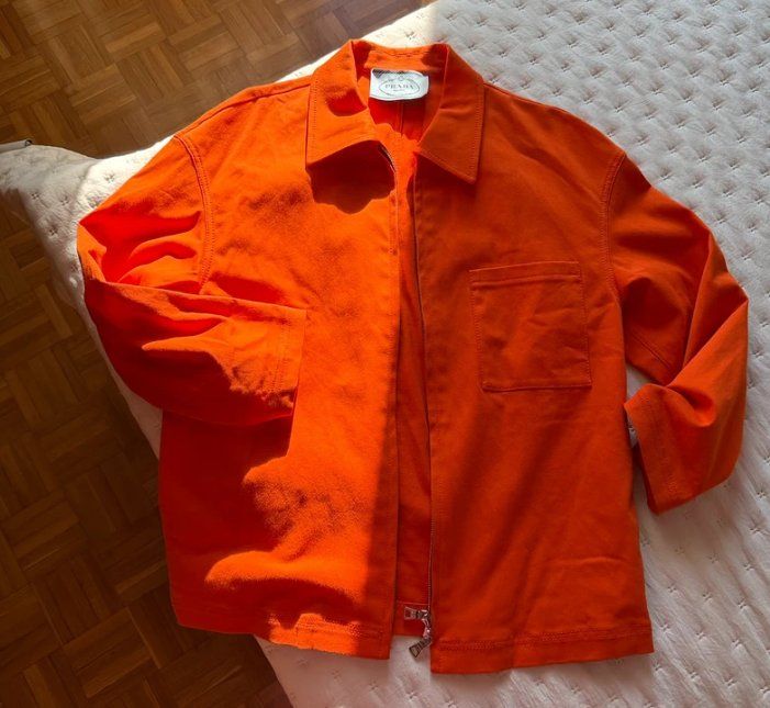 Prada Jacken: Prada orange jacket – Gebraucht aus geneve von chiaraac