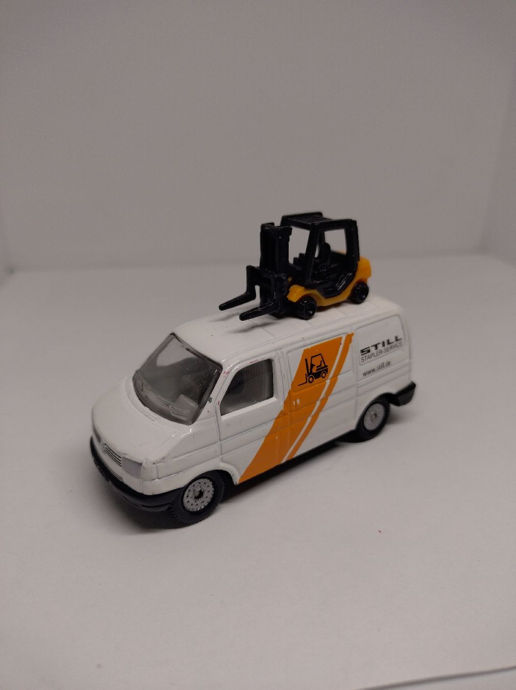 Siku Modellini d'auto: Siku, VW T4 Still avec chariot élévateur – Usato da La Chaux-de-Fonds venduto da Pierrot8404
