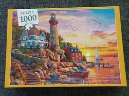 Puzzle Motiv "LEUCHTTURM IM SONNENUNTERGANG"