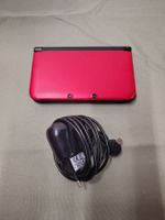 Console Nintendo 3DS en bon état.
