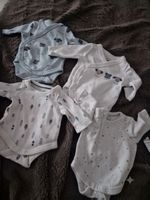 4 Baby Bodys Langarm Set verschiedene Motive Grösse 46