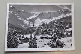 AK CP Arosa Bergkulisse Winter Dörfli verschneite Tannen GR