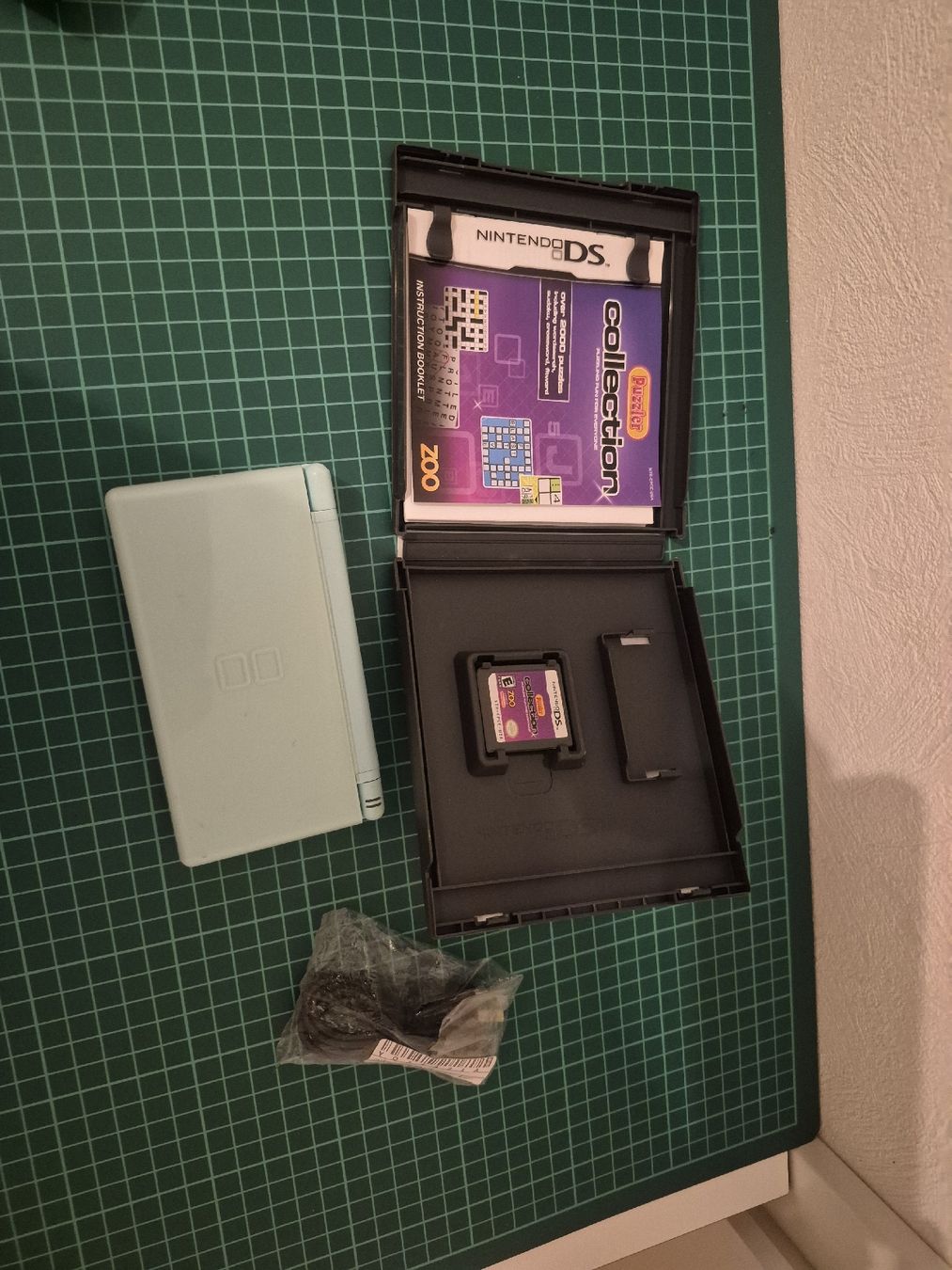Nintendo Konsolen: Nintendo DS Lite - Ice Blue - With Puzzler Collection – Gebraucht aus Meyrin von Retro-GZ 1