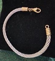 Bracelet mixte  bicolore et pl.or. Jonc  souple. Ferme  bien