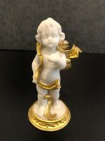 Figurine ange avec bougeoir en céramique