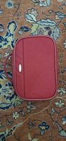 Trousse de toilette rouge pratique, idéale voyage!