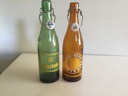 2 bouteilles à bouchon mécanique Warteck et Gurten