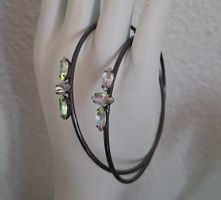 Ohrringe mit.irisierebde Steine 