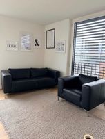 Ledersofa und Sessel schwarz gebrauchter Zustand
