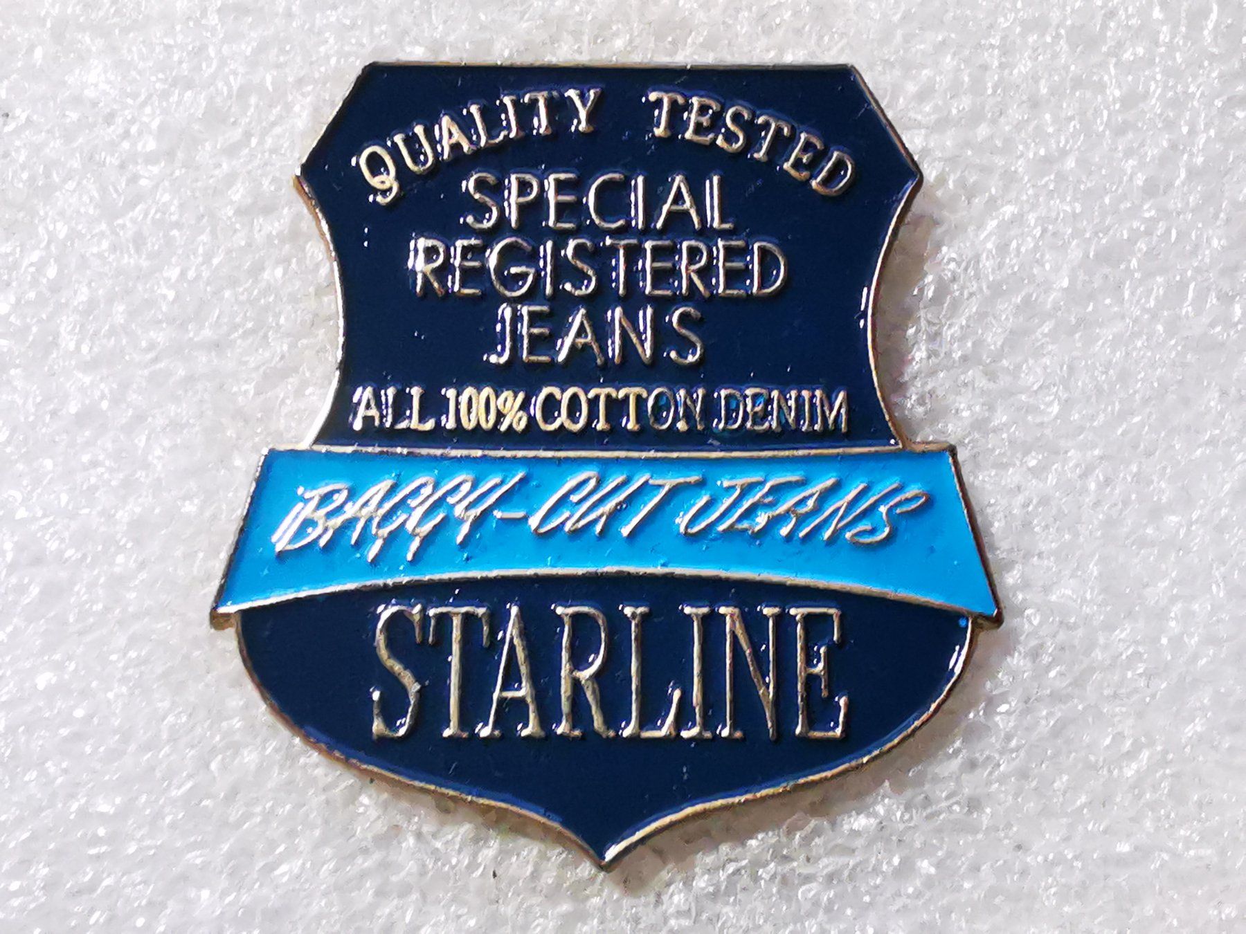 Plaketten & Abzeichen: Ansteckpin 99: Starline – Gebraucht aus Oppligen von Pin-Fall-Shop