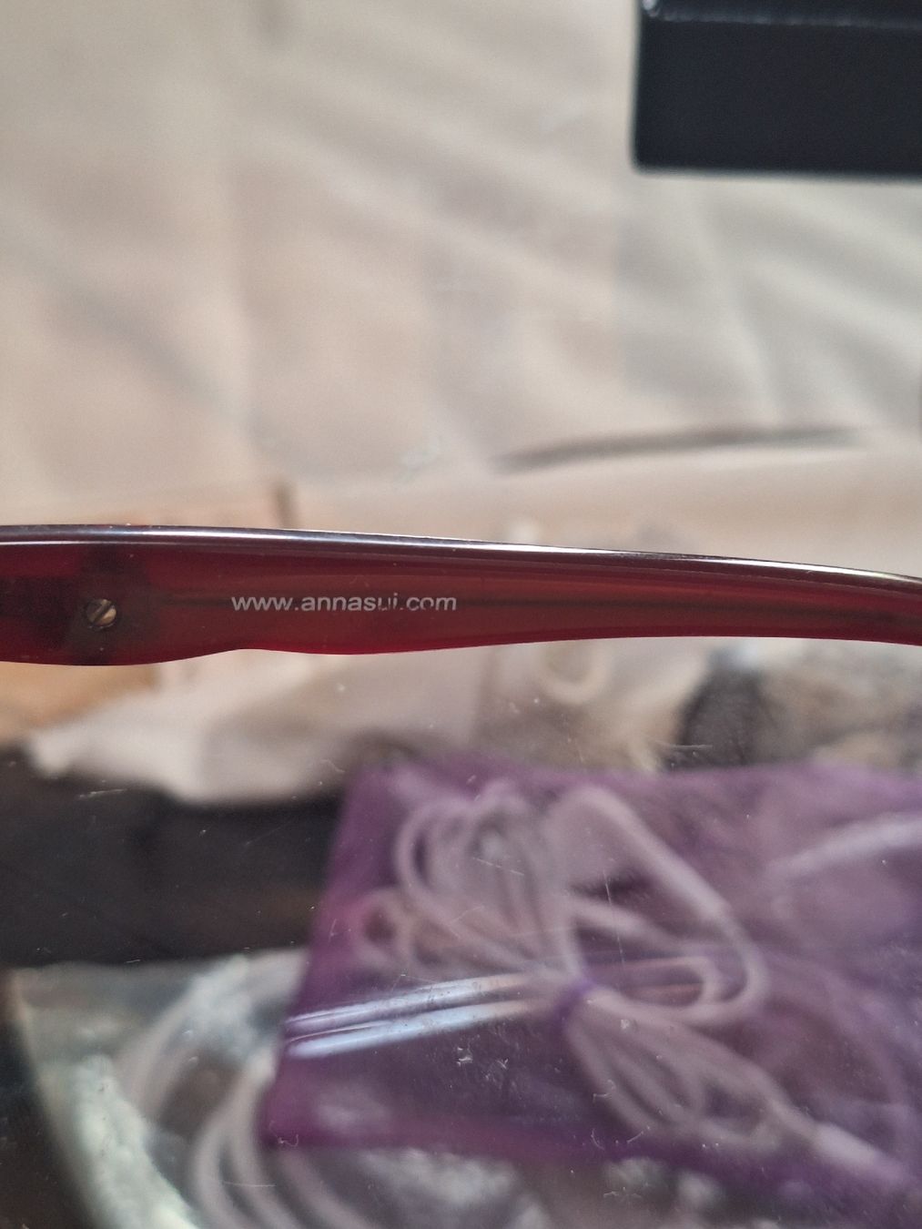 Lunettes & Verres: Lunettes de soleil rouges, bon état – D'occasion à Crans VD par Yobia8 1