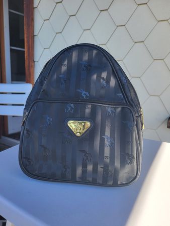 Rucksack Molle schwarz mit Logo Muster guter Zustand