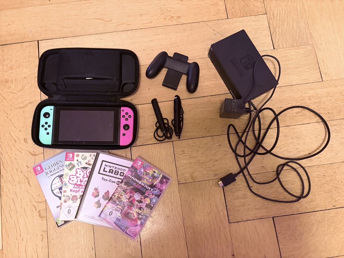 Nintendo Konsolen: Nintendo Switch Konsole mit Spielen und Zubehör – Gebraucht aus Muttenz von cho_xj52