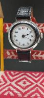 Montre bracelet années 20's femme argent