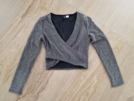 Glitzershirt mit V-Ausschnitt