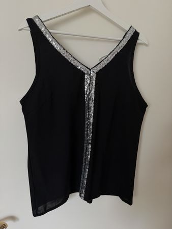 Haut noir avec paillettes taille M