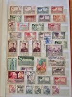Briefmarken weltweit in Album rot Zustand gemäss Bilder