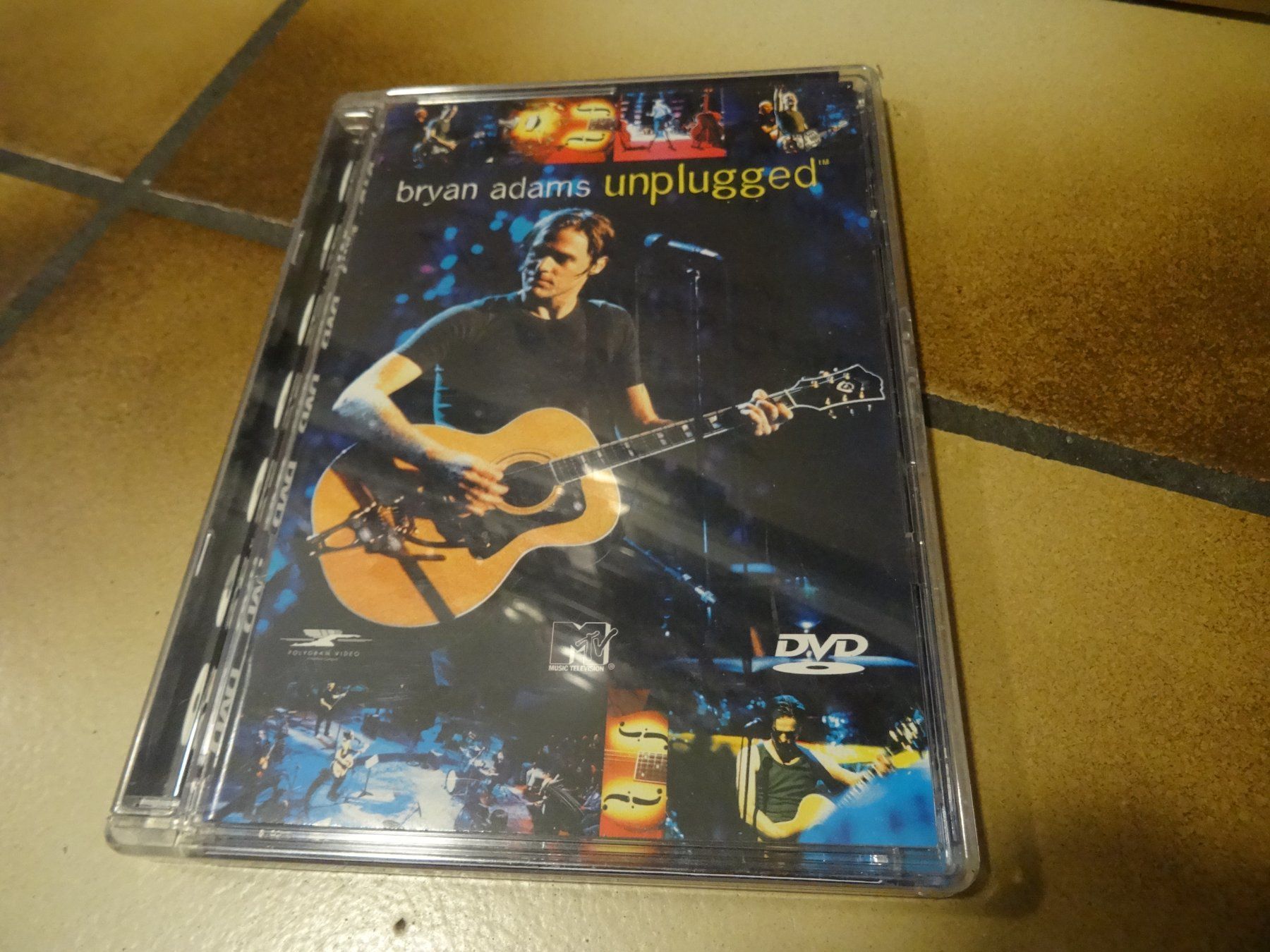 Alle DVDs: Bryan Adams Unplugged DVD – Gebraucht aus Olten von Disc-Ausverkauf