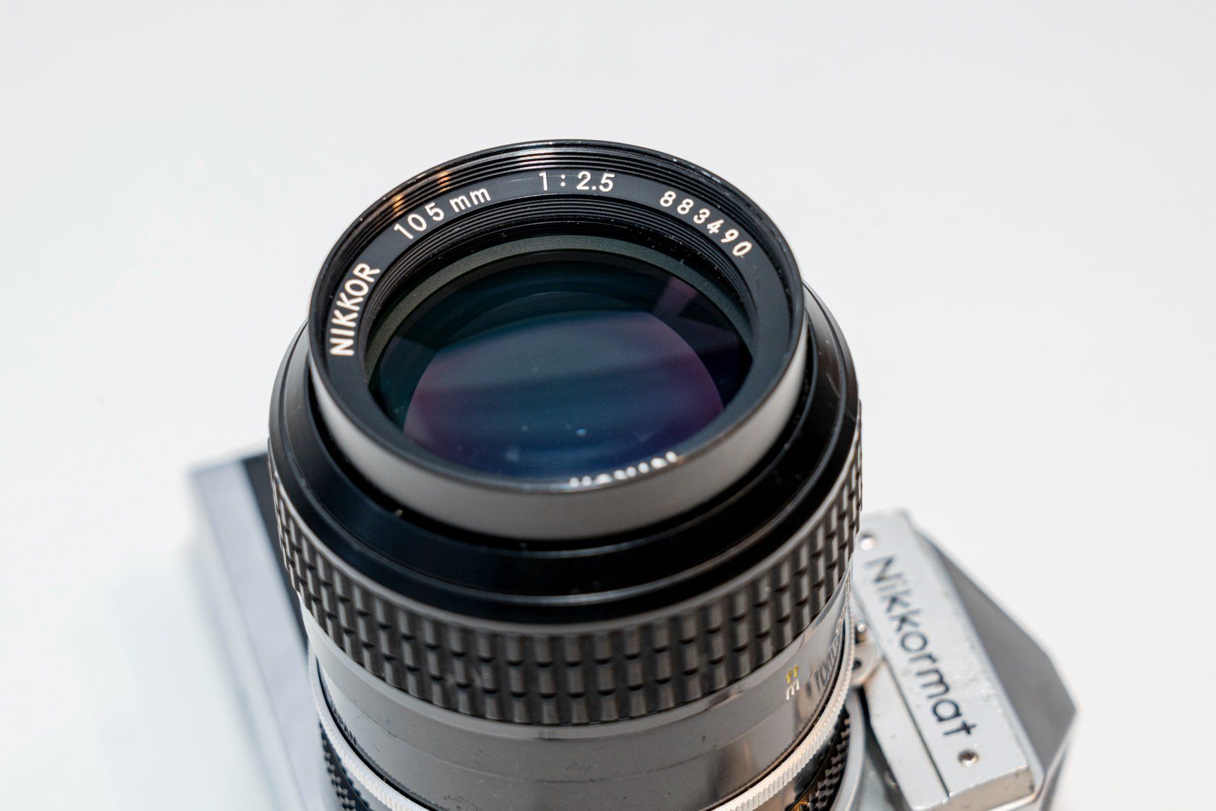 Nikkormat Kamera: Nikkormat + Nikkor 105mm 1:2.5 – Gebraucht aus Grandvaux von RGKeller 3