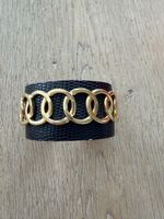 Bracelet manchette noir et doré - Tendance actuelle!